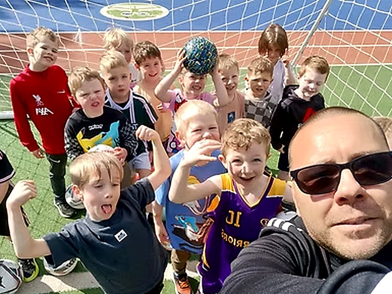 Angelo coaching older players at NEXTGEN Football Academy